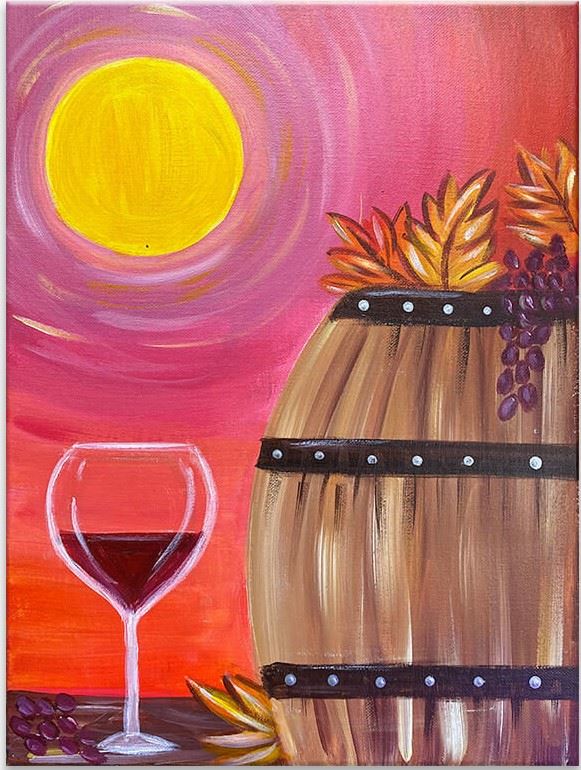 Round yellow sun behind a wine glass next to a barrel with orange leaves