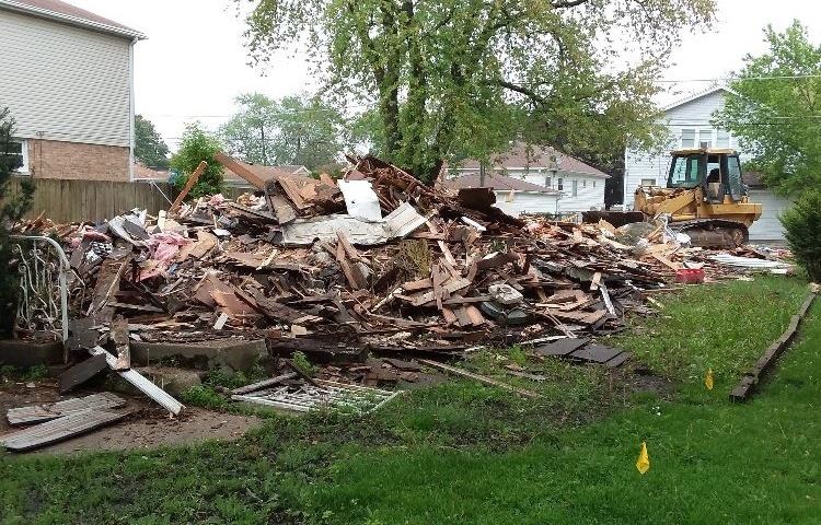 A pile of rubble at 2525 Spruce Street where an abandoned home used to sit