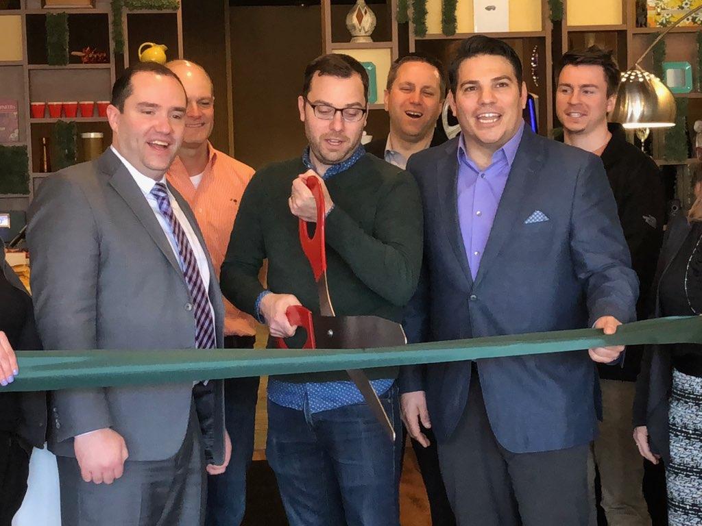 Mayor Guerin, Brian Wilson and Ricardo Braglia cut the ribbon to officially open Stella’s Place.